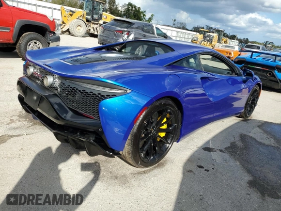 2024 McLaren Artura z VIN SBM16AEA2RW002389, wystawiony jako Copart lot #74246334 z przebiegiem 1374 mil mil oraz Nie do naprawy. Historia ofert i sprzedaży dostępna na DreamBid. Obrazek 3.