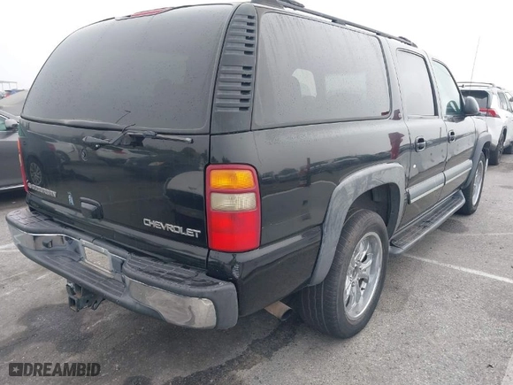 2003 Chevrolet Suburban LT with VIN 3GNFK16Z33G213287, listed as a IAAI auction lot 41670719 with NaN miles. Bid and sale history available at carsss.com. Image 4.