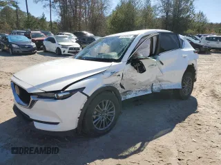 2021 Mazda CX-5 Touring with VIN JM3KFACM3M0442960, listed as a Copart auction lot 46253525 with 55,598 mi miles and Salvage Title. Bid and sale history available at carsss.com. Image 1.