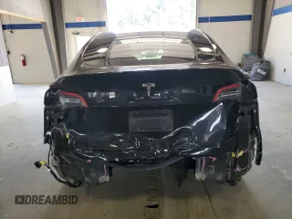 2021 Tesla Model Y Long Range z VIN 5YJYGAEE0MF298016, wystawiony jako Copart lot #55916955 z przebiegiem 59 578 mil mil oraz Szkoda całkowita • Salvage title. Historia ofert i sprzedaży dostępna na DreamBid. Obrazek 6.