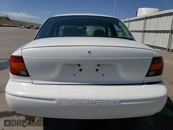 2002 Saturn SL z VIN 1G8ZH52882Z253088, wystawiony jako Copart lot #55062225 z przebiegiem 177 866 mil mil oraz Szkoda całkowita • Salvage title. Historia ofert i sprzedaży dostępna na DreamBid. Obrazek 6.