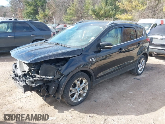 2016 Ford Escape Titanium with VIN 1FMCU9JX4GUB38303, listed as a IAAI auction lot 41788421 with 138,511 mi miles and . Bid and sale history available at DreamBid. Image 23.