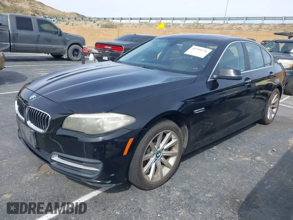 2014 BMW 5 Series 535i with VIN WBA5B1C54ED476763, listed as a IAAI auction lot 41590236 with 115,048 mi miles and . Bid and sale history available at DreamBid. Image 2.