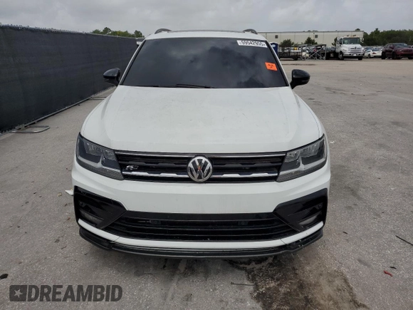 2021 Volkswagen Tiguan SE z VIN 3VV3B7AX9MM133615, wystawiony jako Copart lot #59542955 z przebiegiem 69 946 mil mil oraz Czysty tytuł • Clean title. Historia ofert i sprzedaży dostępna na DreamBid. Obrazek 5.