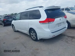 2014 Toyota Sienna LE AAS with VIN 5TDKK3DC0ES525654, listed as a IAAI auction lot 42153582 with 71,258 mi miles and . Bid and sale history available at carsss.com. Image 3.
