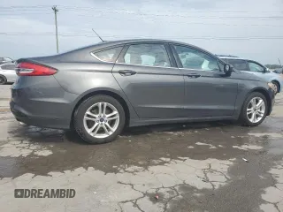 2018 Ford Fusion SE с VIN 3FA6P0HD3JR231639, выставлен на аукционе Copart как лот 59798395 с пробегом 121 368 миль миль и Списание • Salvage title. История ставок и продаж доступна на DreamBid. Изображение 3.
