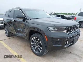 2022 Jeep Grand Cherokee Overland z VIN 1C4RJKDG9N8564844, wystawiony jako IAAI lot #42155499 z przebiegiem 50 224 mil mil oraz . Historia ofert i sprzedaży dostępna na DreamBid. Obrazek 1.