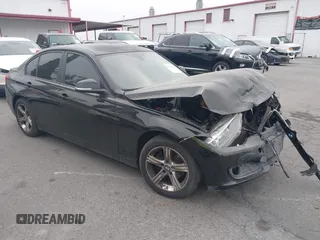 2013 BMW 3 Series 320i with VIN WBA3B1C57DK128344, listed as a IAAI auction lot 42259273 with 105,213 mi miles and . Bid and sale history available at DreamBid. Image 1.