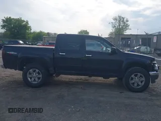2010 GMC Canyon SLE1 z VIN 1GTJTCDEXA8109443, wystawiony jako IAAI lot #42240716 z przebiegiem 160 500 mil mil oraz . Historia ofert i sprzedaży dostępna na DreamBid. Obrazek 14.