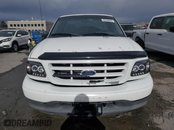 2002 Ford F-150 XL with VIN 1FTRF17212KC06180, listed as a Copart auction lot 45336625 with 214,139 mi miles and Salvage title. Bid and sale history available at DreamBid. Image 5.