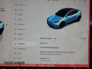 2023 Tesla Model Y Long Range with VIN 7SAYGDEEXPA078937, listed as a Copart auction lot 47095285 with 28,521 mi miles and Salvage Title. Bid and sale history available at DreamBid. Image 9.