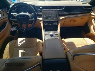 2023 Jeep Grand Cherokee Summit Reserve with VIN 1C4RJYE60P8881133, listed as a Copart auction lot 52354915 with 31,739 mi miles and Salvage title. Bid and sale history available at DreamBid. Image 8.