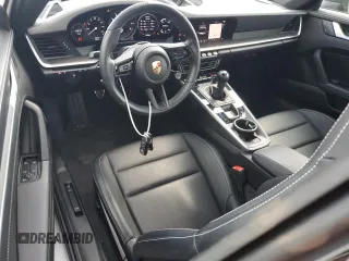 2024 Porsche 911 Carrera S with VIN WP0AB2A94RS219603, listed as a Copart auction lot 77205934 with 3,357 mi miles and Salvage Title. Bid and sale history available at carsss.com. Image 8.