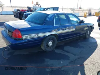 2004 Ford Police Interceptor Base w/3.27 Axle with VIN 2FAFP71W54X101274, listed as a IAAI auction lot 41164206 with 128,237 mi miles and . Bid and sale history available at DreamBid. Image 4.