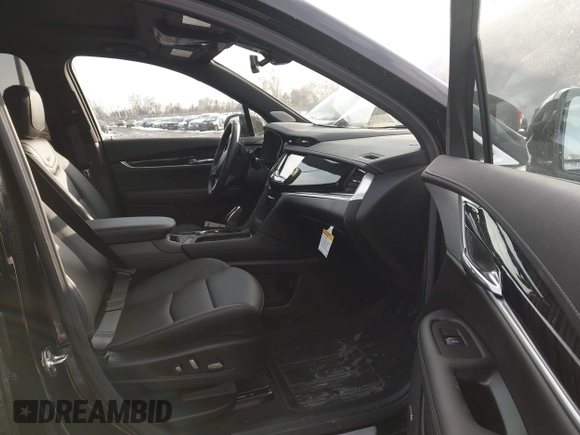 2025 Cadillac XT6 FWD Premium Luxury with VIN 1GYKPCRS6SZ104902, listed as a IAAI auction lot 41565224 with 4,735 mi miles and . Bid and sale history available at DreamBid. Image 5.