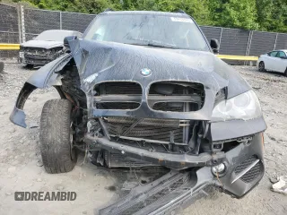 2012 BMW X5 35i with VIN 5UXZV4C5XCL761370, listed as a Copart auction lot 59436845 with 124,722 mi miles and Salvage title. Bid and sale history available at DreamBid. Image 5.