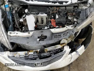2011 Honda Fit z VIN JHMGE8H72BC801321, wystawiony jako Copart lot #89294505 z przebiegiem 357 680 mil mil oraz Szkoda całkowita • Salvage title. Historia ofert i sprzedaży dostępna na DreamBid. Obrazek 11.