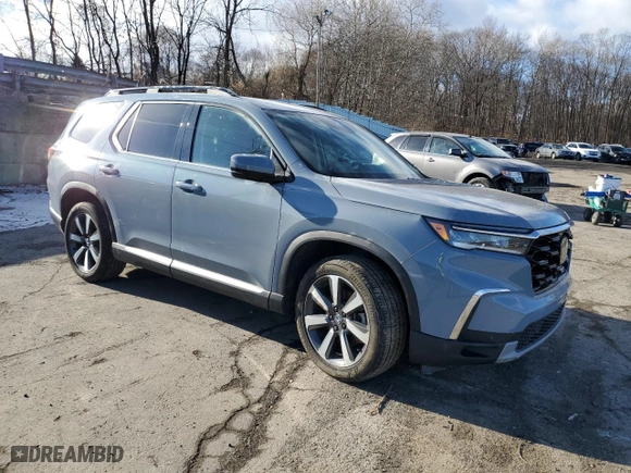 2024 Honda Pilot Touring with VIN 5FNYG1H72RB039998, listed as a Copart auction lot 86590424 with 22,770 mi miles and Salvage Title. Bid and sale history available at carsss.com. Image 4.