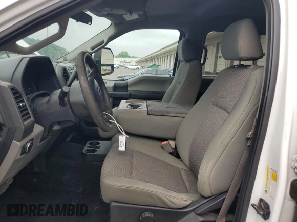 2019 Ford F-250 XL with VIN 1FT7W2BT9KED08872, listed as a Copart auction lot 64000735 with 89,099 mi miles and Salvage title. Bid and sale history available at DreamBid. Image 7.