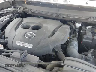 2023 Mazda CX-9 Touring Plus with VIN JM3TCBAY9P0657854, listed as a IAAI auction lot 41931409 with 54,036 mi miles and . Bid and sale history available at DreamBid. Image 10.