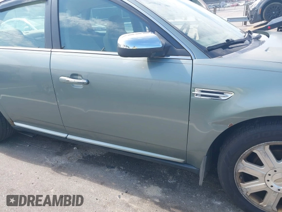 2008 Ford Taurus Limited z VIN 1FAHP25W28G115988, wystawiony jako IAAI lot #42726146 z przebiegiem 232 790 mil mil oraz . Historia ofert i sprzedaży dostępna na DreamBid. Obrazek 12.
