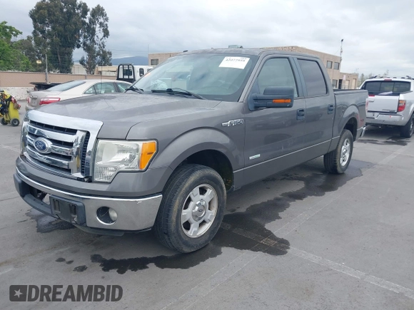 2011 Ford F-150 XLT with VIN 1FTFW1CT8BKD21411, listed as a IAAI auction lot 42077959 with 152,665 mi miles. Bid and sale history available at carsss.com. Image 2.