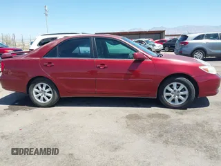 2002 Toyota Camry LE z VIN 4T1BE32K52U082454, wystawiony jako IAAI lot #42276881 z przebiegiem 225 814 mil mil oraz . Historia ofert i sprzedaży dostępna na DreamBid. Obrazek 13.