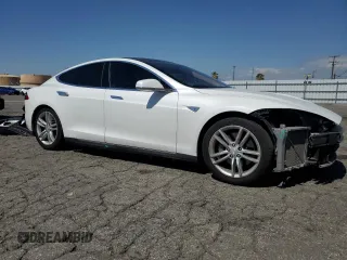 2013 Tesla Model S with VIN 5YJSA1CGXDFP03603, listed as a Copart auction lot 49352135 with 129,203 mi miles and Salvage title. Bid and sale history available at DreamBid. Image 4.
