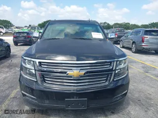 2017 Chevrolet Suburban Premier with VIN 1GNSCJKC4HR127667, listed as a IAAI auction lot 41936945 with 139,006 mi miles. Bid and sale history available at carsss.com. Image 6.