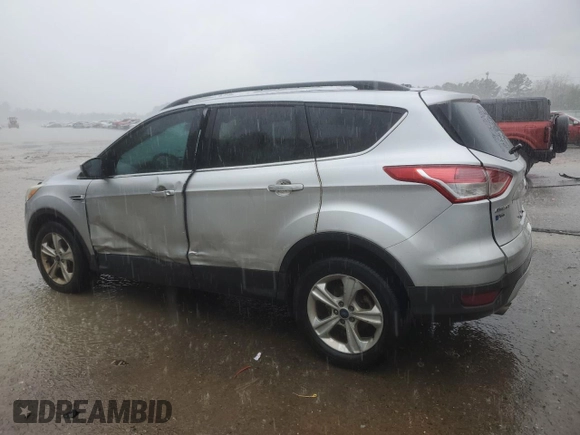 2014 Ford Escape SE with VIN 1FMCU0G90EUC27903, listed as a Copart auction lot 51216885 with 133,948 mi miles and Salvage Title. Bid and sale history available at carsss.com. Image 2.