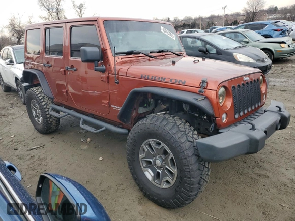 2014 Jeep Wrangler Unlimited Rubicon with VIN 1C4BJWFG0EL187243, listed as a Copart auction lot 45865005 with 53,064 mi miles and Salvage title. Bid and sale history available at DreamBid. Image 4.