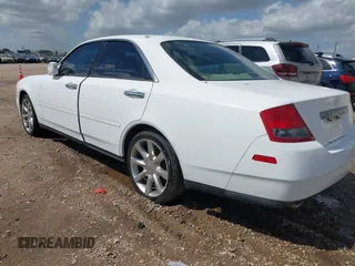 2003 Infiniti M45 with VIN JNKAY41E83M000273, listed as a IAAI auction lot 41720783 with 167,936 mi miles. Bid and sale history available at carsss.com. Image 3.