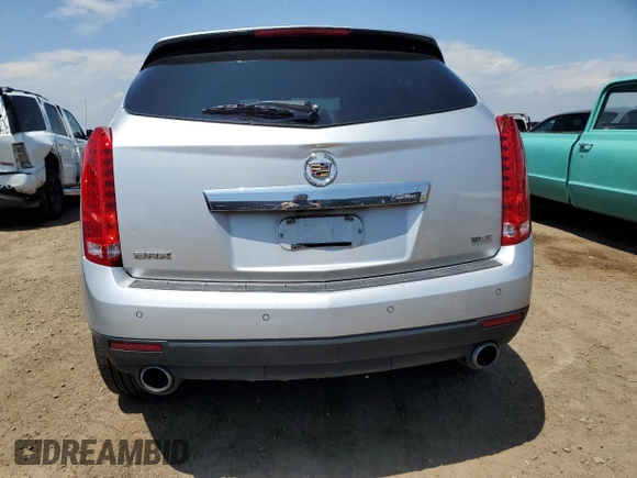 2015 Cadillac SRX Performance Collection with VIN 3GYFNCE37FS585204, listed as a Copart auction lot 59966935 with 50,781 mi miles and Salvage title. Bid and sale history available at DreamBid. Image 6.