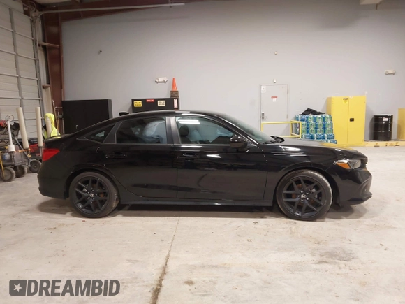 2024 Honda Civic Sport with VIN 2HGFE2F59RH519889, listed as a IAAI auction lot 41598192 with 7,451 mi miles and . Bid and sale history available at DreamBid. Image 13.
