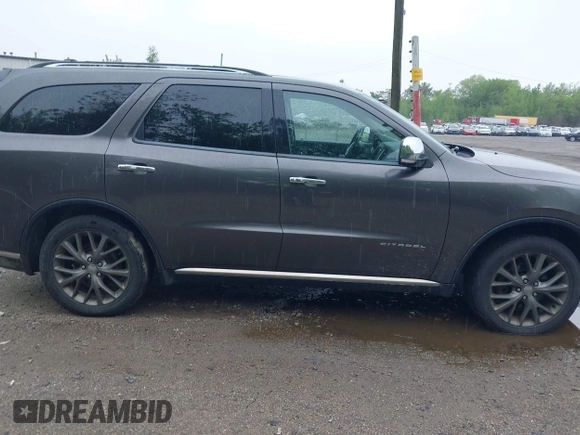 2014 Dodge Durango Citadel with VIN 1C4RDJEG2EC520939, listed as a IAAI auction lot 42272953 with 191,458 mi miles and . Bid and sale history available at DreamBid. Image 13.