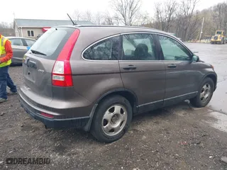 2010 Honda CR-V LX with VIN 5J6RE4H30AL012299, listed as a IAAI auction lot 42052865 with 160,786 mi miles. Bid and sale history available at carsss.com. Image 4.