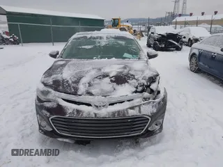 2014 Toyota Avalon Limited with VIN 4T1BK1EB1EU106004, listed as a IAAI auction lot 41341771 with 86,608 mi miles and . Bid and sale history available at DreamBid. Image 12.