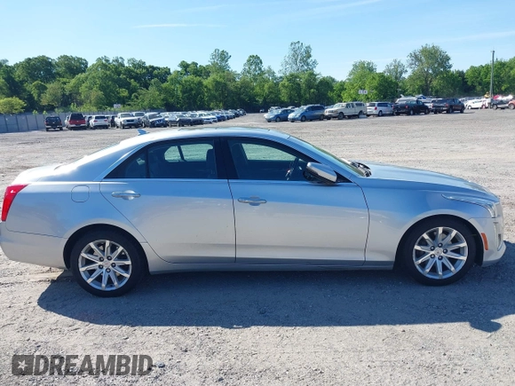 2014 Cadillac CTS Luxury AWD with VIN 1G6AX5S34E0124464, listed as a IAAI auction lot 42298607 with 89,351 mi miles and . Bid and sale history available at DreamBid. Image 13.