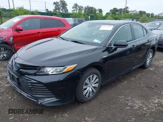 2019 Toyota Camry Hybrid LE z VIN 4T1B31HK5KU510055, wystawiony jako IAAI lot #42325522 z przebiegiem 97 000 mil mil oraz . Historia ofert i sprzedaży dostępna na DreamBid. Obrazek 20.