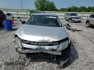 2012 Ford Fusion SEL with VIN 3FAHP0JG9CR157630, listed as a Copart auction lot 61682695 with 154,281 mi miles and Salvage title. Bid and sale history available at DreamBid. Image 13.
