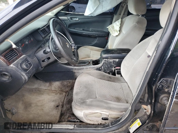 2014 Chevrolet Impala LT with VIN 2G1WB5E39E1151119, listed as a Copart auction lot 60650045 with 229,498 mi miles and Salvage title. Bid and sale history available at DreamBid. Image 7.