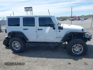 2014 Jeep Wrangler Unlimited Sahara with VIN 1C4BJWEG6EL203866, listed as a IAAI auction lot 41846091 with 105,296 mi miles. Bid and sale history available at carsss.com. Image 13.