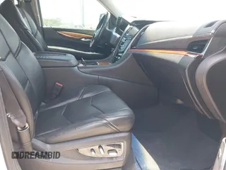 2015 Cadillac Escalade Premium z VIN 1GYS3NKJ0FR500158, wystawiony jako IAAI lot #42439343 z przebiegiem 159 487 mil mil oraz . Historia ofert i sprzedaży dostępna na DreamBid. Obrazek 5.