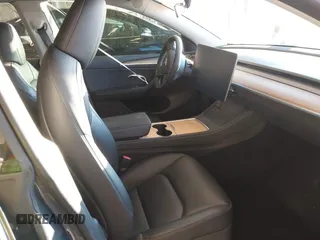 2023 Tesla Model Y Long Range with VIN 7SAYGDEE5PA033341, listed as a IAAI auction lot 41379625 with Not provided miles and . Bid and sale history available at DreamBid. Image 5.
