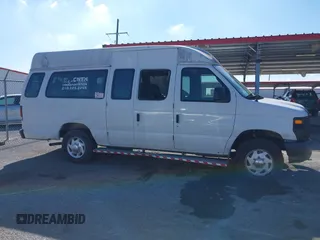 2012 Ford Econoline Cargo Commercial with VIN 1FTNS2EW4CDA50633, listed as a IAAI auction lot 40694015 with 309,334 mi miles. Bid and sale history available at carsss.com. Image 13.