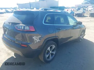 2020 Jeep Cherokee Limited with VIN 1C4PJLDB2LD538348, listed as a IAAI auction lot 41700016 with 155,163 mi miles. Bid and sale history available at carsss.com. Image 4.