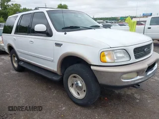 1998 Ford Expedition XLT z VIN 1FMPU18L0WLB36090, wystawiony jako IAAI lot #42196591 z przebiegiem 138 996 mil mil oraz . Historia ofert i sprzedaży dostępna na DreamBid. Obrazek 1.