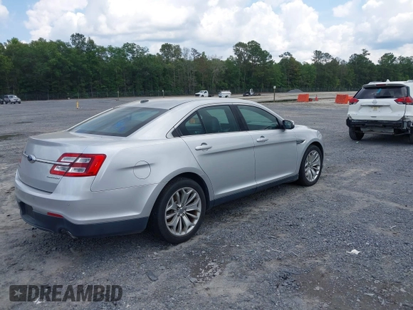 2013 Ford Taurus Limited with VIN 1FAHP2F87DG235392, listed as a IAAI auction lot 42431543 with 123,904 mi miles and . Bid and sale history available at DreamBid. Image 4.