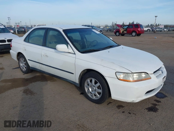 1999 Honda Accord LX with VIN JHMCG665XXC014090, listed as a IAAI auction lot 41765749 with 231,682 mi miles and . Bid and sale history available at DreamBid. Image 1.