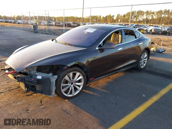 2013 Tesla Model S with VIN 5YJSA1CN7DFP22690, listed as a IAAI auction lot 40981089 with 188,057 mi miles. Bid and sale history available at carsss.com. Image 2.